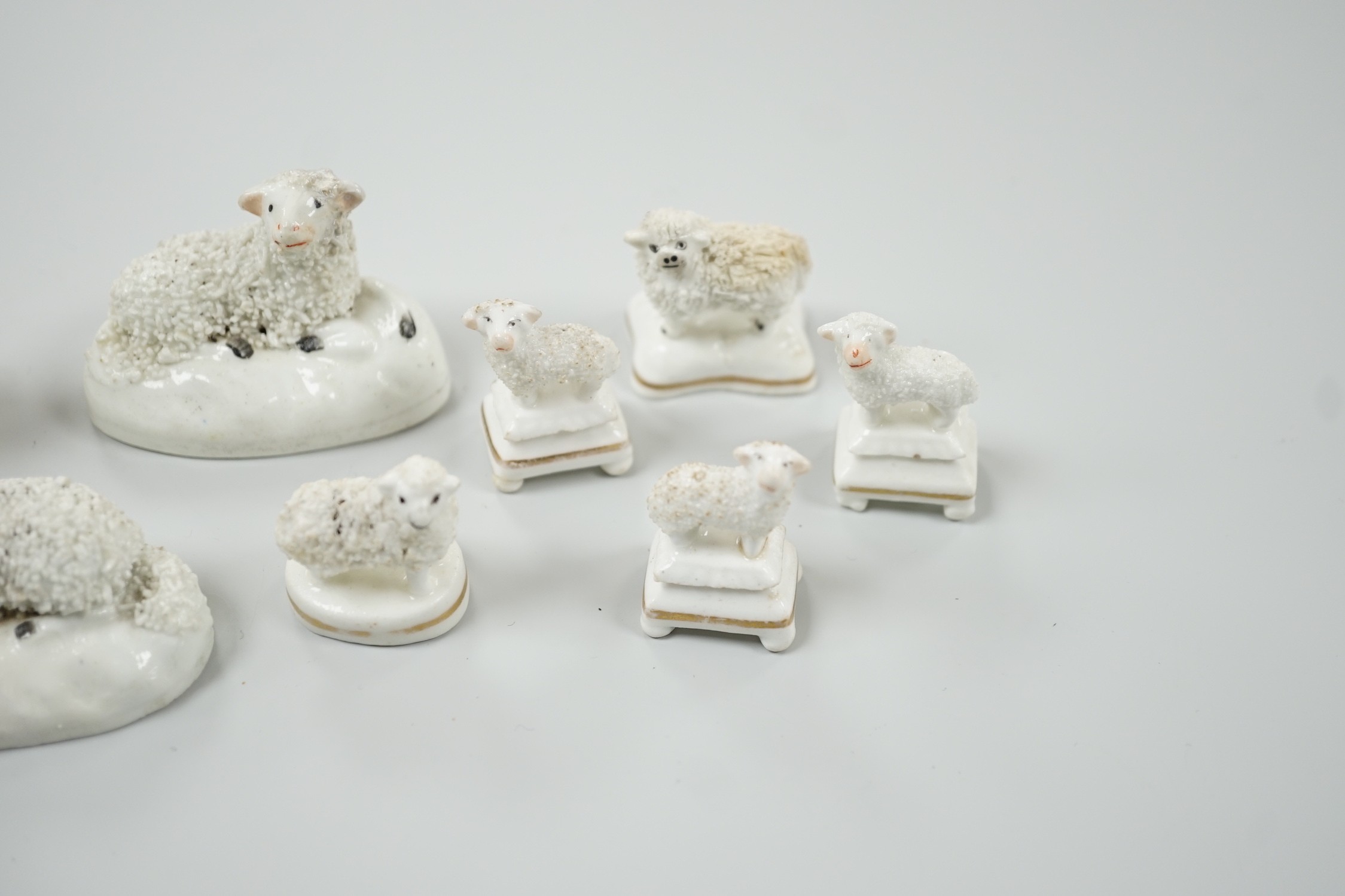 Three small Staffordshire models of sheep, together with five toy Staffordshire models of sheep, c.1830-50 (8). Tallest 5cm, Provenance: Dennis G.Rice collection